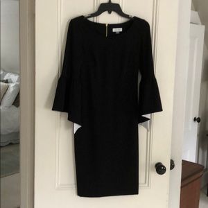 Black dress with flounce sleeve